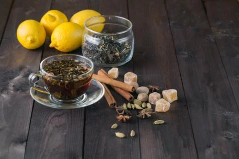 Cup of herbal tea, spices and lemon Foto stock