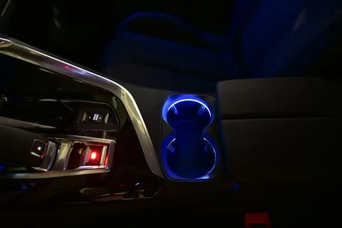 Cup holder between the front seats in the car Stock Photos