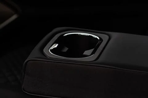 Cup holder in car. Interior view of modern car. Modern car cup holder Stock Photos