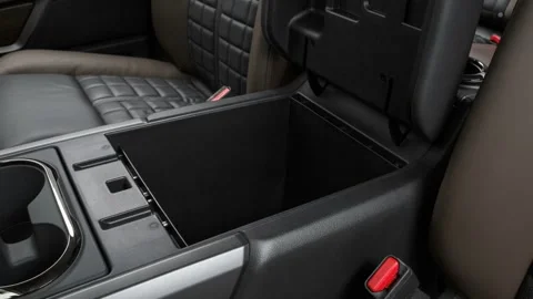 Cup holder close up in car interior  2016 Nissan Titan XD Platinum Reserve Stock Footage 159872289