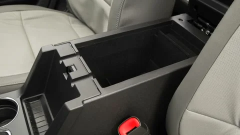 Cup holder close up in car interior  2016 Ford Flex SEL Stock Footage 159874171