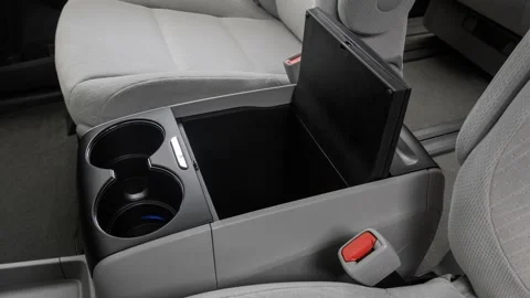 Cup holder close up in car interior  2017 Toyota Sienna LE Stock Footage 159908062