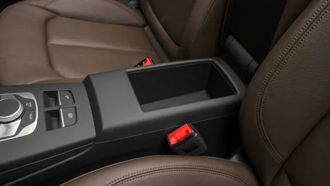 Cup holder close up in car interior  2017 Audi A3 Premium 2.0 TFSI Stock Footage 159930507