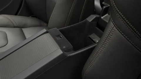 Cup holder close up in car interior  2017 Volvo V60 Cross Country T5 AWD Stock Footage 159938535