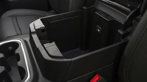 Cup holder close up in car interior  2019 GMC Sierra 1500 Denali Stock Footage 160037187