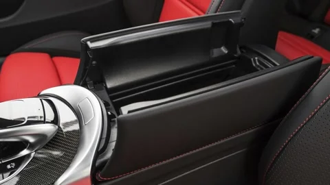 Cup holder close up in car interior  2019 Mercedes-Benz C-Class AMG C63 S Stock Footage 160053807