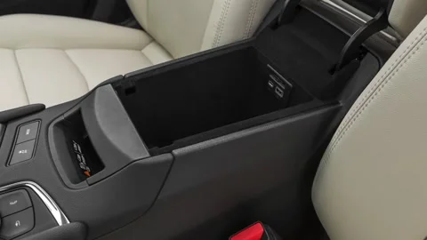 Cup holder close up in car interior  2020 Cadillac XT5 Sport Stock Footage 160109058