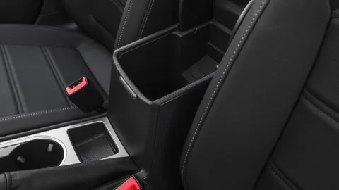 Cup holder close up in car interior  2020 Volkswagen Passat SE Video stock 160109577