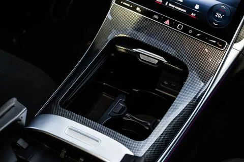 Cup holders inside modern car interior. Interior view of modern car. Stock Photos