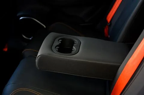 Cup holders inside modern car interior Stock Photos