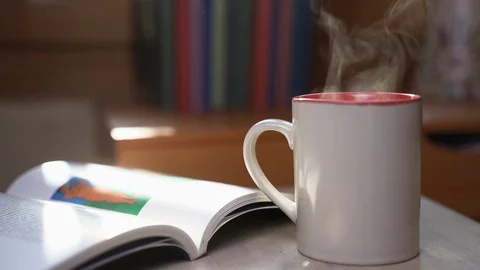 Cup of hot beverage with steam Stock Footage 123769300