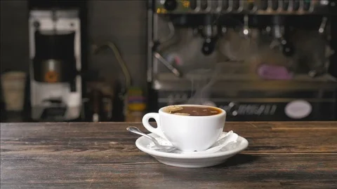 Cup of hot coffee on the bar Stock Footage 92541878