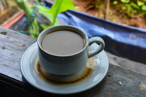 Cup of hot coffee with ceramic mug in the morning Stock Photos