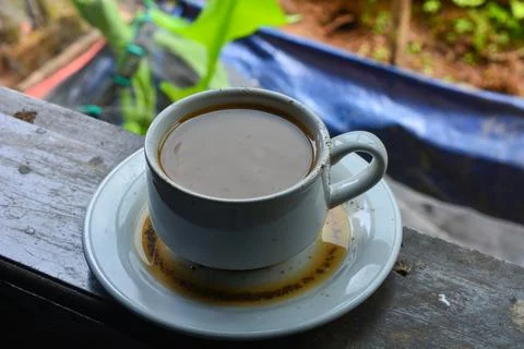 Cup of hot coffee with ceramic mug in the morning Stock Photos