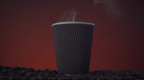 Cup of hot coffee with steam on a dark background Stock Footage 55291921