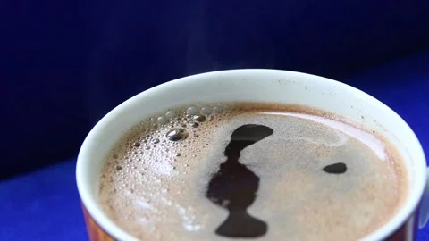 Cup of hot coffee steaming, close up view Stock Footage 152020584