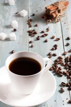 A cup of hot coffee with sugar and cinnamon Stock Photos