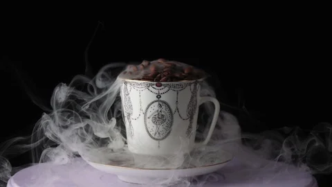 Cup with hot drink. coffee beans Stock Footage 101766646