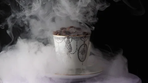 Cup with hot drink. coffee beans Stock Footage 101766660