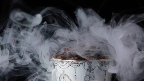Cup with hot drink. coffee beans Stock Footage 101766943