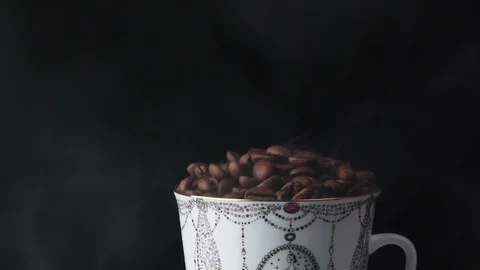 Cup with hot drink. coffee beans Stock Footage 101766960