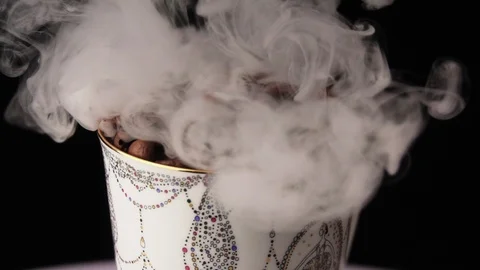 Cup with hot drink. coffee beans Stock Footage 101767204