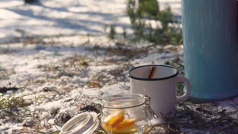 A cup with a hot drink in the winter forest. Stock Footage 91181024