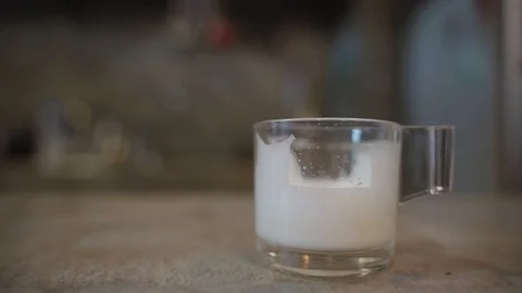 Cup of hot milk Stock Footage 100876121