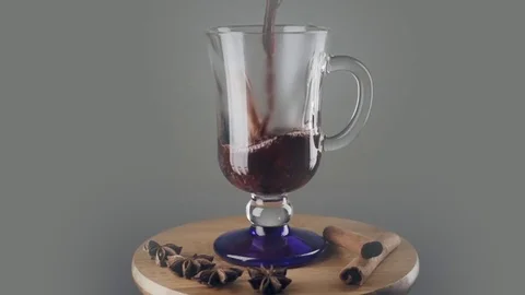 A cup of hot mulled wine. Slow motion Stock Footage 78483005