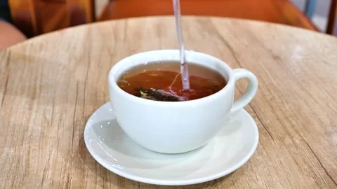 A cup of hot tea Stock Footage 261191056