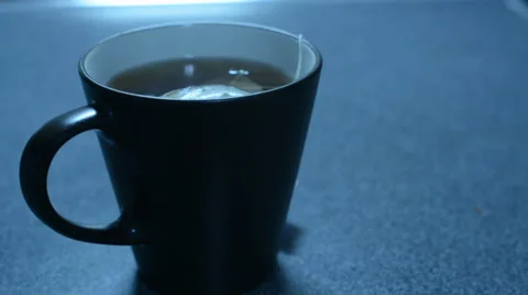 Cup of hot tea on kitchen counter 動画素材 36981208