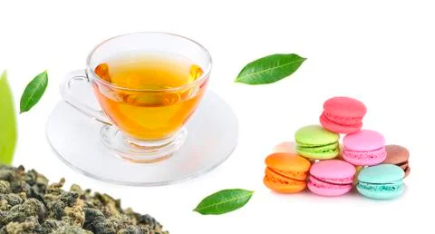 Cup of hot tea set with macaroons Stock Photos