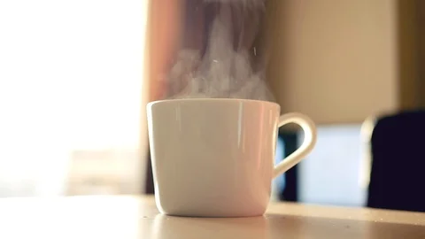 A cup of invigorating coffee with steam. HD, 1920x1080, slow motion Stock Footage 123297818