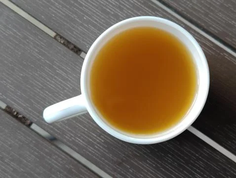 A cup of invigorating tea on the table Stock-Fotos