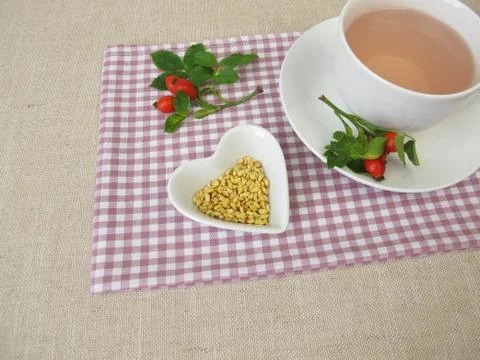 A cup of kernels tea from rose hip seeds Stock-Fotos