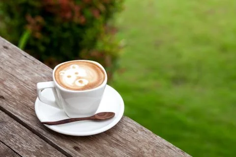 Cup of latte coffee like face bear Stock Photos