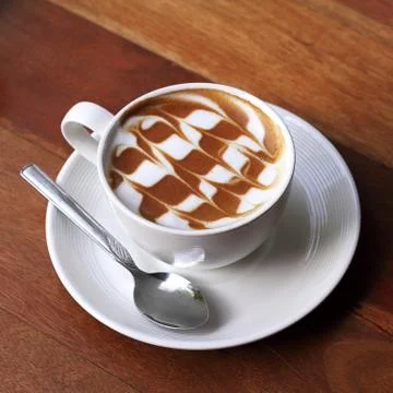Cup of latte coffee Stock Photos