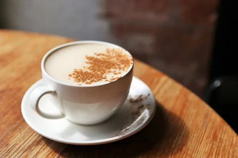 Cup of  latte in the table Photos