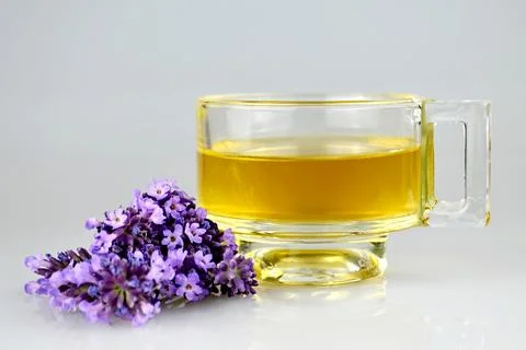 Cup of lavender tea Stock Photos