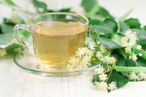 Cup of linden tea Stock Photos