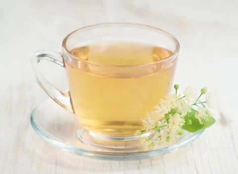 Cup of linden tea Stock Photos