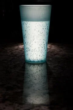 Cup looks as though it's glowing from inside Stock Photos