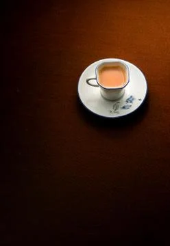 A cup of milk tea on the table Stock Photos