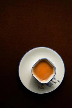 A cup of milk tea on the table Stock Photos