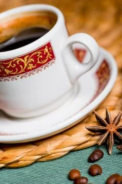 Cup with a pattern with coffee and anise Stock Photos