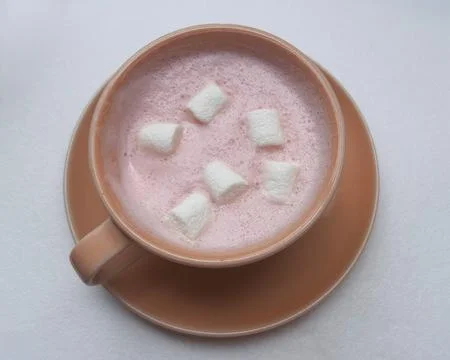 Cup of pink ruby cocoa chocolate with marshmallows Stock Photos