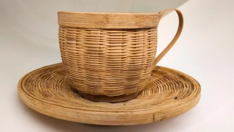 Cup plate set made of wicker Stock Photos