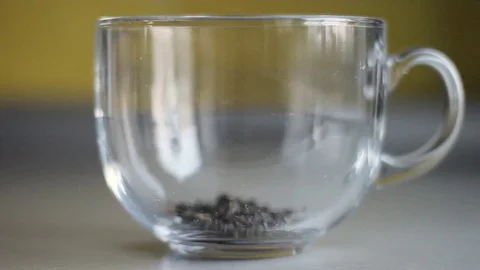 Cup pours tea real-time Stock Footage 73791445