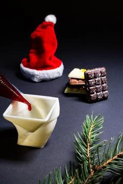 A cup printed with chocolate on a 3D printer with berry jam Stock Photos