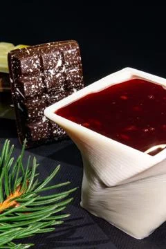 A cup printed with chocolate on a 3D printer with berry jam Stock-Fotos